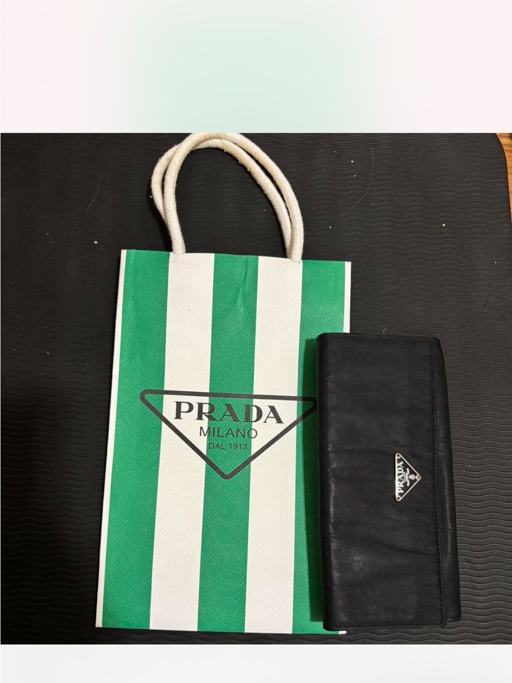 Prada Black Leather Trifold Wallet with Silver Triangle Emblem
